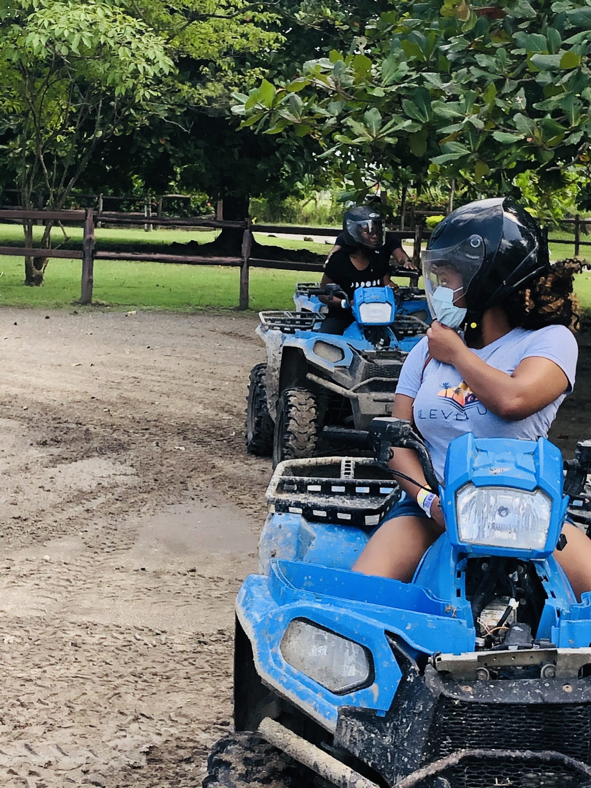 Black woman on four wheeler in Jamaica